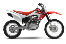 New 2017 HONDA CRF150F RED Choosing the right dirt bike for a smaller rider is about three things: the right fit, an appropriate amount of power, and quality. The Honda CRF150F takes our entry-level dirt bike and moves it up a notch or two. It’s a little taller, to fit taller riders. It also offers an easy-to-use electric starter. In terms of power, its smooth four-stroke engine delivers plenty, but the powerband is tuned to be plenty rider friendly too. Pro-Link® rear suspension takes on the bumps and knocks of the trail. A five-speed transmission gives your rider the control of a big bike. And then there’s Honda’s legendary reliability and build quality—things no other brand can begin to touch.